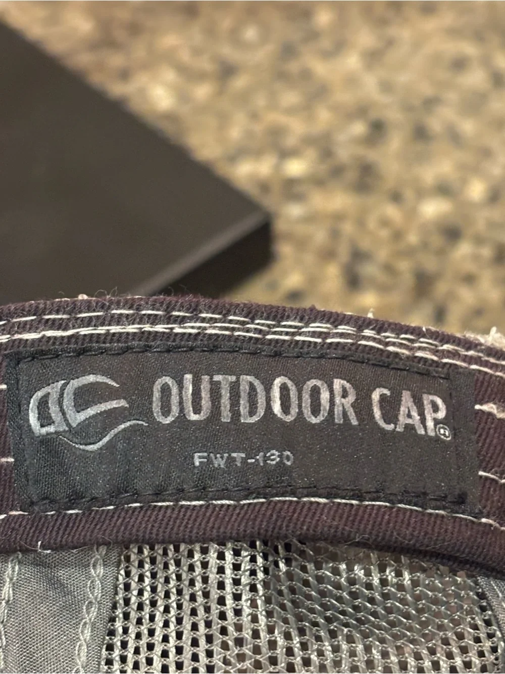 Hotworx brand yoga baseball cap features a classic fitness mesh back in gray.